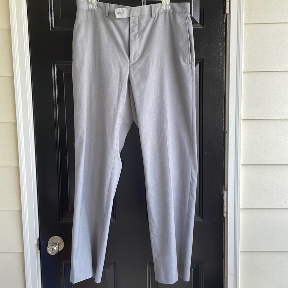 Light grey Calvin Klein machine washable Dress pants 34”W and 32L. Great shape